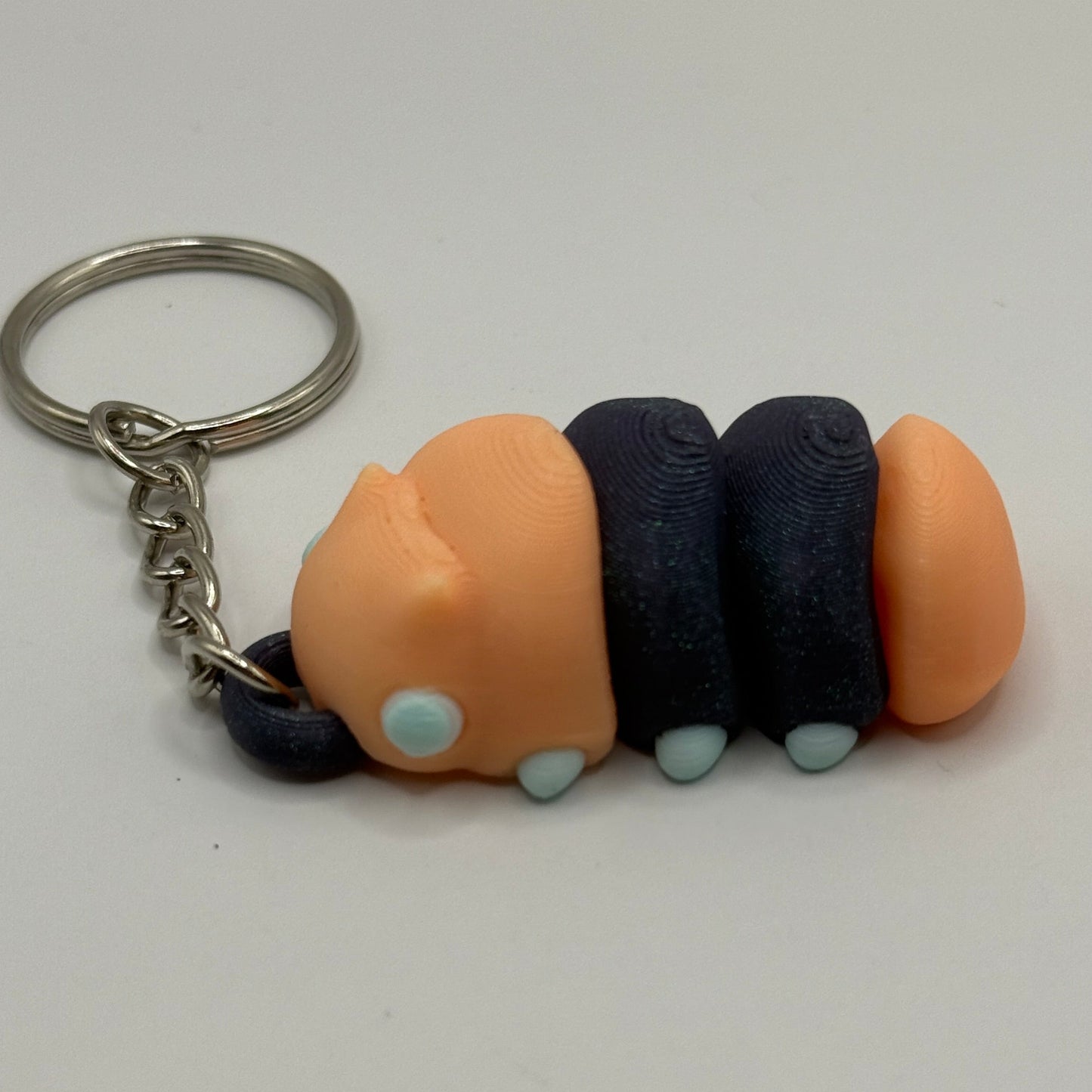 Glow-in-the-Dark Grub Worm Keychain – Cute Creepy Crawly Fidget Friend