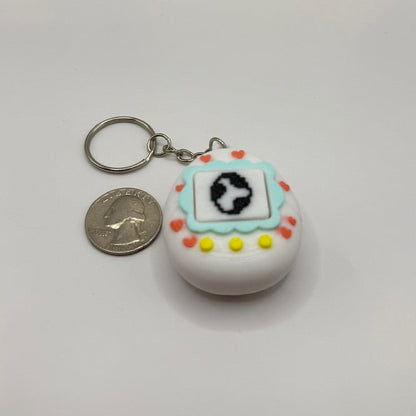 Clicky Tamagotchi-Style Keychain – Retro Pixel Pet Fidget