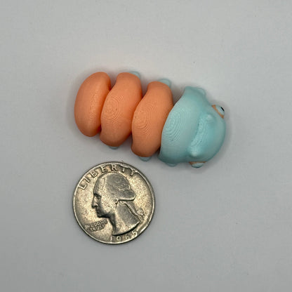 Mini Flexi Glow-in-the-Dark Grub Worm — Small, Squishy, and Night-Time Magical