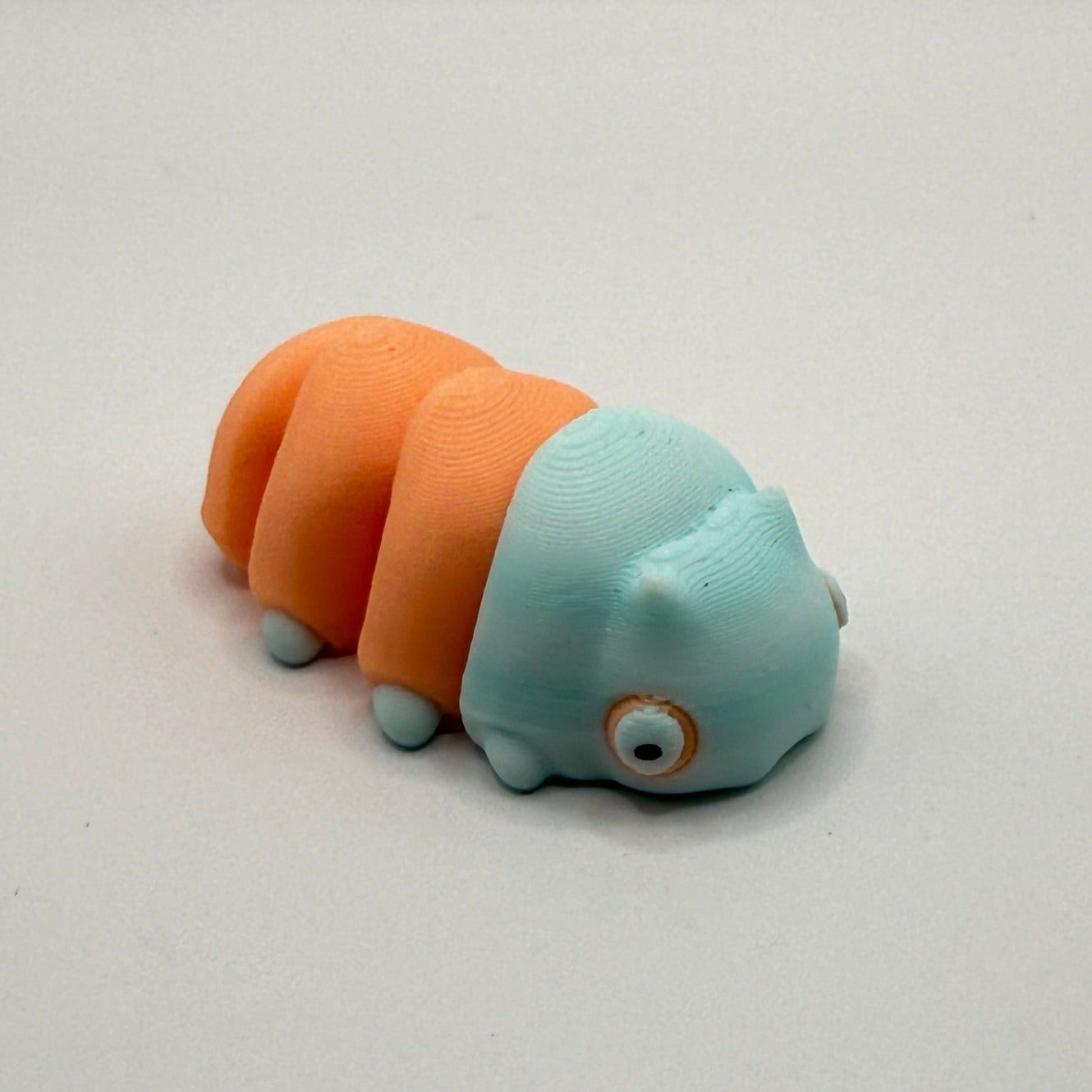 Mini Flexi Glow-in-the-Dark Grub Worm — Small, Squishy, and Night-Time Magical